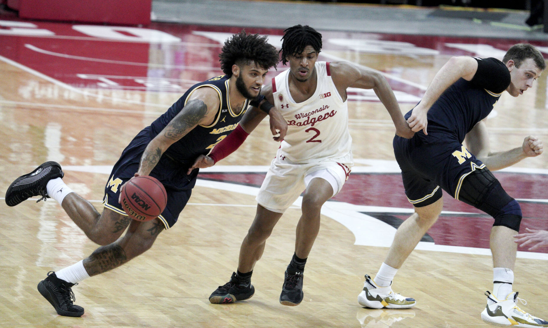 Michigan 67, UW 59